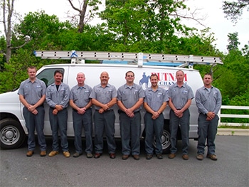 Putnam Team in front of Company Vehicle