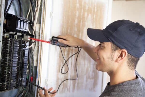 Electrician Working on Electrical Panel in Mooresville, NC.