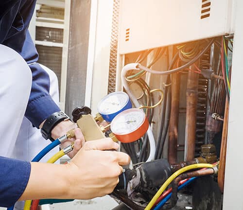 HVAC Technician Performing AC Maintenance in Concord, NC